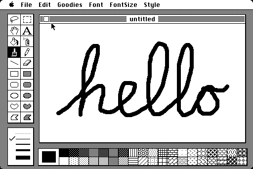 Hello, world! In MacPaint, the word 'hello' is written in cursive.